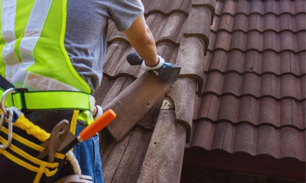 Professional contractor performing roof repair and tile roofing services in Wexford Plantation, Hilton Head Island, SC.