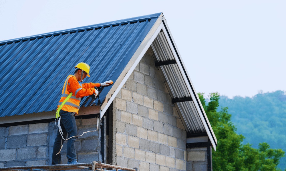 Professional roofer installing a roof in Palmetto Dunes Plantation, showcasing roofing services with safety gear and active construction work.